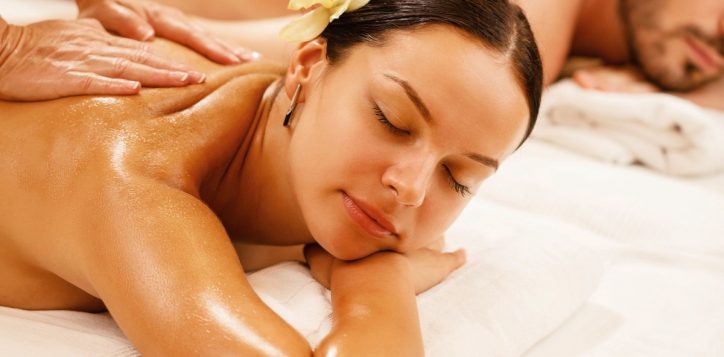 young-couple-relaxing-during-back-massage-health-spa-focus-is-young-woman_0-2-2
